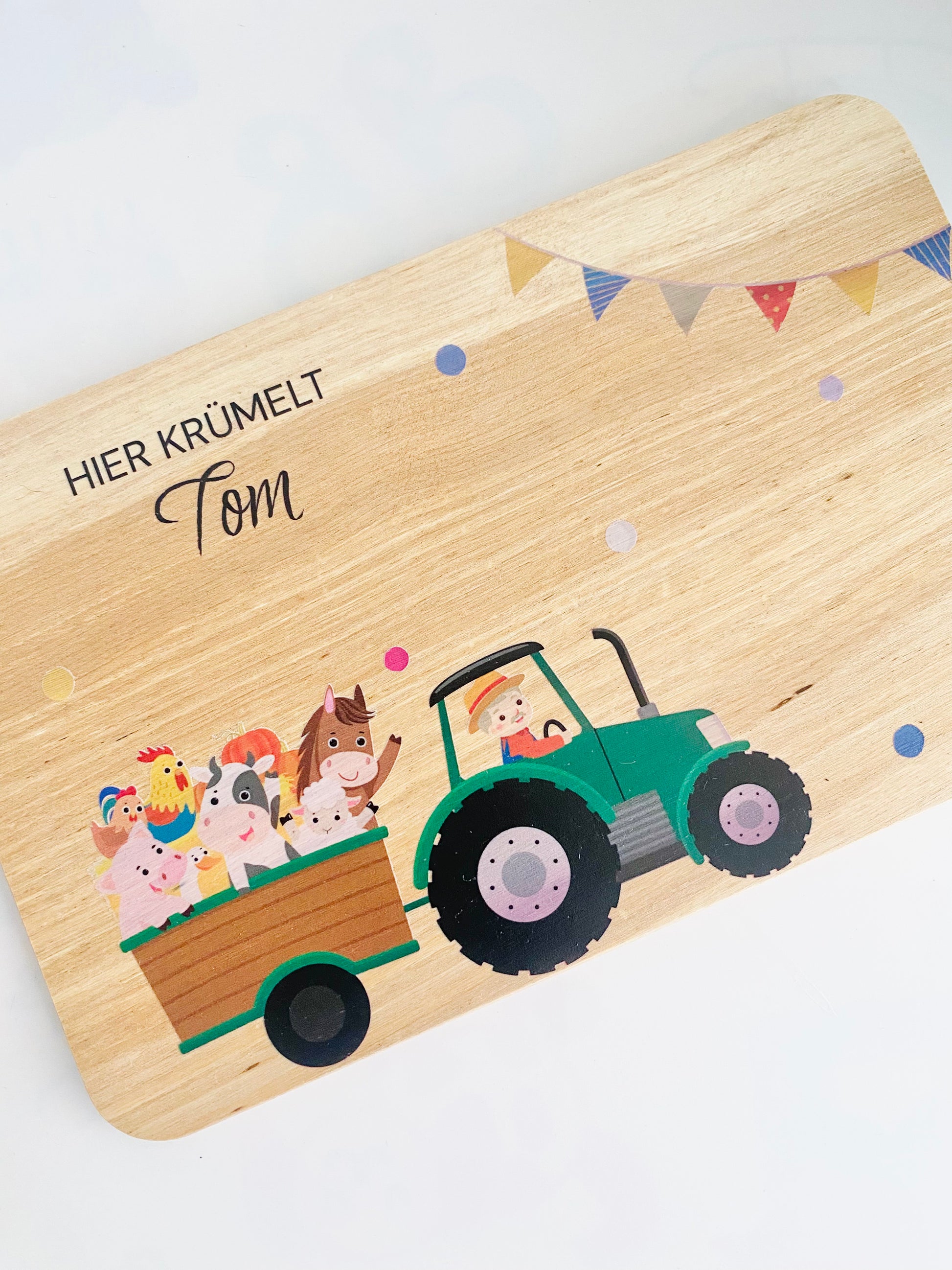 Here Crumbles bread board with Green truck motif.