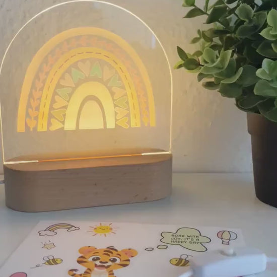 Warm white light night lamp with rainbow design emitting perfect light for nursery. nachtlicht für babys