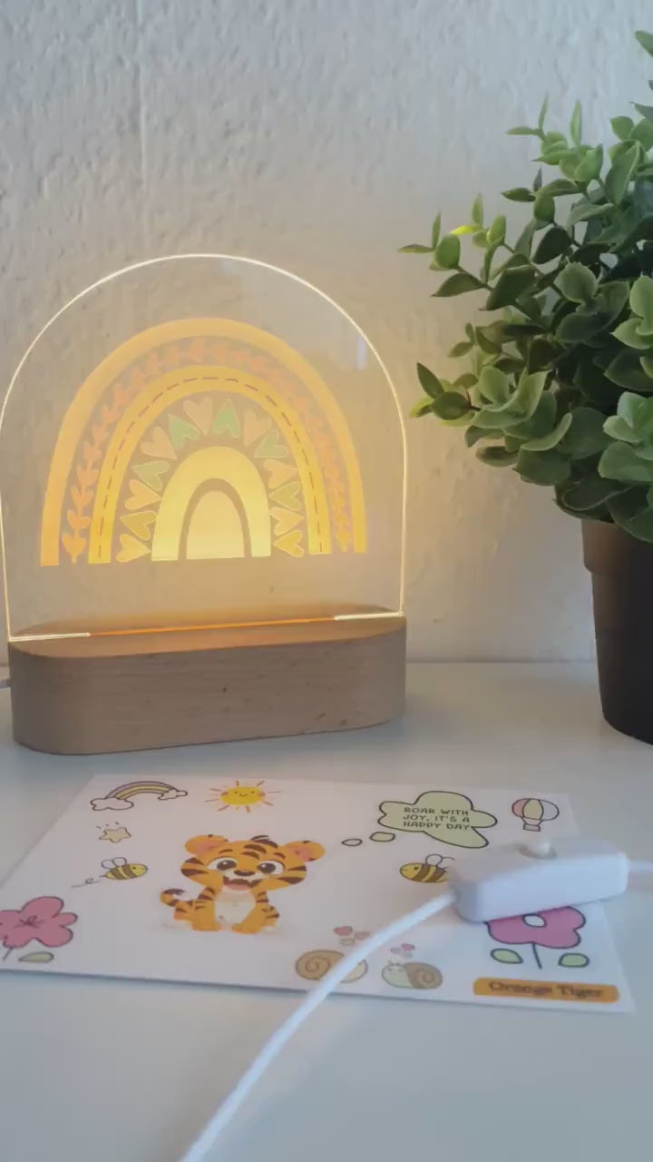 Warm white light night lamp with rainbow design emitting perfect light for nursery. nachtlicht für babys